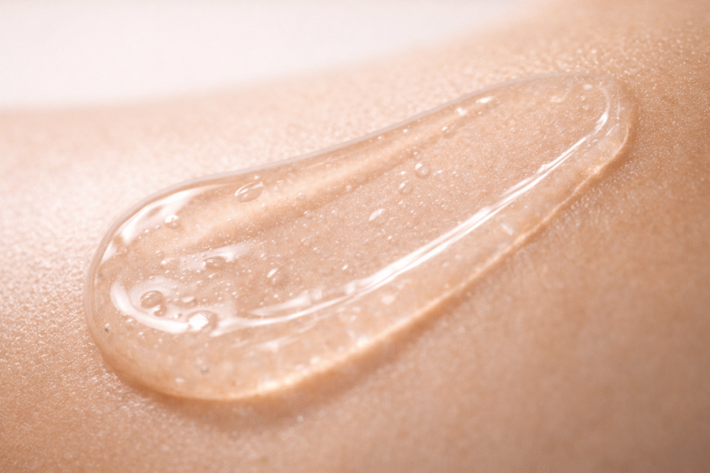 applying serum with a dropper during a gentle skincare routine for hydrated, glowing skin